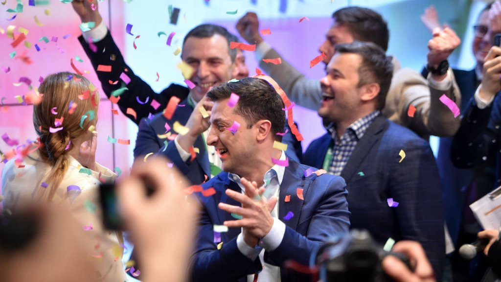 Sergei Gapon, AFP | Ukrainian comedian and presidential candidate Volodymyr Zelensky reacts after the announcement of the first exit poll results in the second round of Ukraine's presidential election at his campaign headquarters in Kiev on April 21.