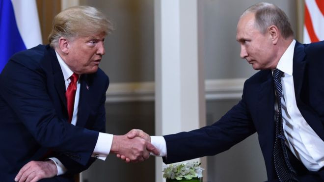 BRENDAN SMIALOWSKI/GETTY / Mr Trump and Mr Putin at their controversial meeting in Helsinki