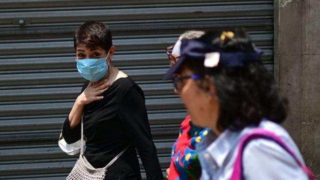 AFP / Some residents donned face masks as pollution levels rose