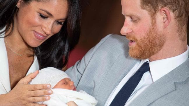 Britain's Prince Harry, Duke of Sussex (R), and his wife Meghan, Duchess of Sussex, pose for a photo with their newborn baby son, Archie Harrison Mountbatten-Windsor. Picture: AFPSource:AFP