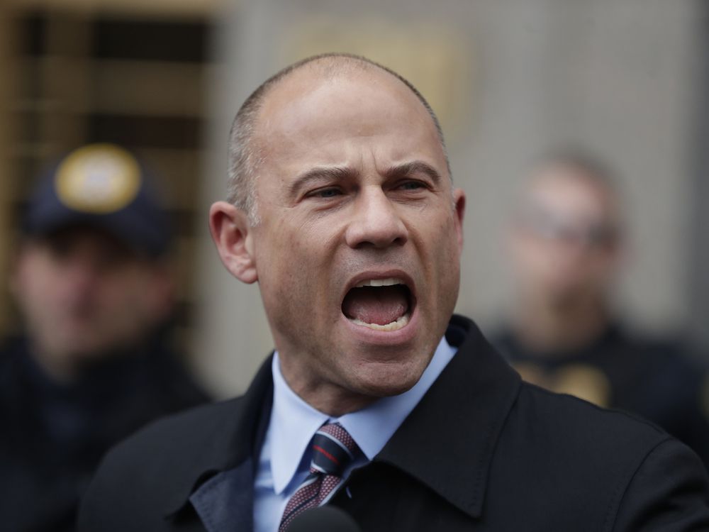 In this Dec. 12, 2018 file photo, Michael Avenatti, lawyer for porn star Stormy Daniels, speaks outside court in New York. Julio Cortez / AP
