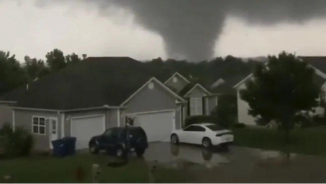 The tornado caused some damage in the town of Carl Junction, about 6.44 kilometres north of the Joplin airport. Picture: Chris Higgins via APSource:AP