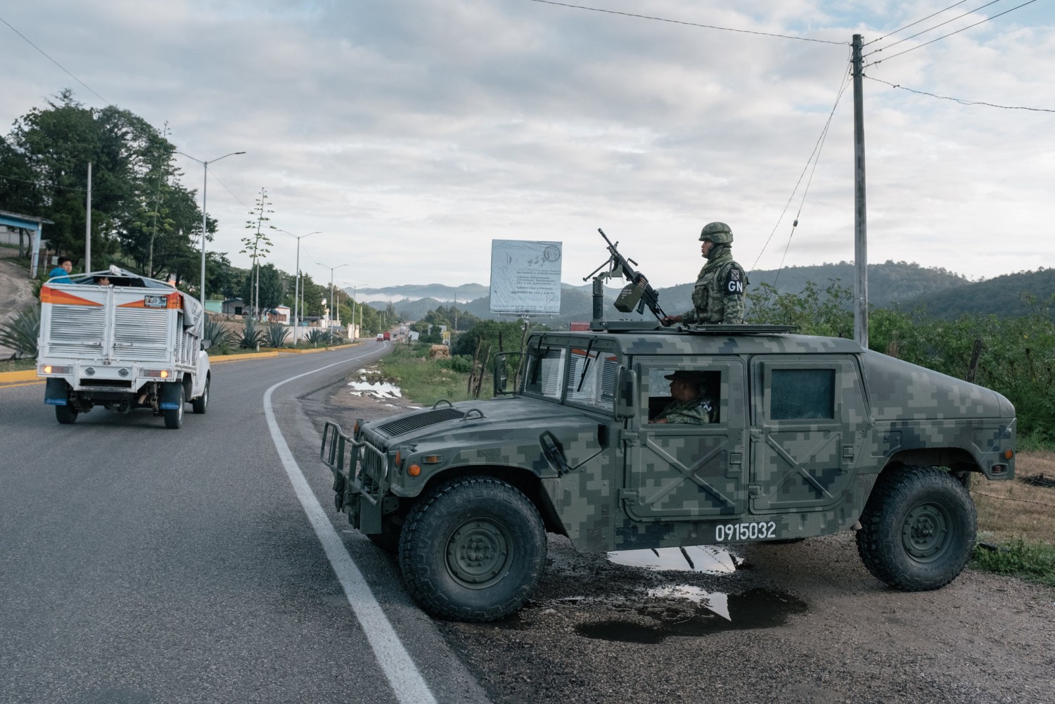 Soldiers working with Mexico’s National Guard waiting at an immigration checkpoint in southern Mexico this month.CreditLuis Antonio Rojas for The New York Times