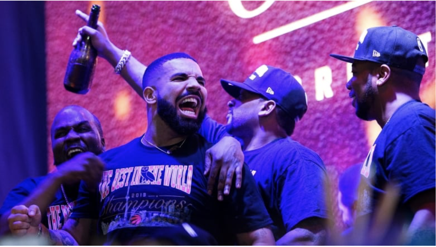 Drake reacts on stage in Toronto's Jurassic Park as the Toronto Raptors win the NBA Championship on Thursday. Shortly after the Game 6 victory, the rapper announced two new songs and new album art. (Nathan Denette/The Canadian Press)