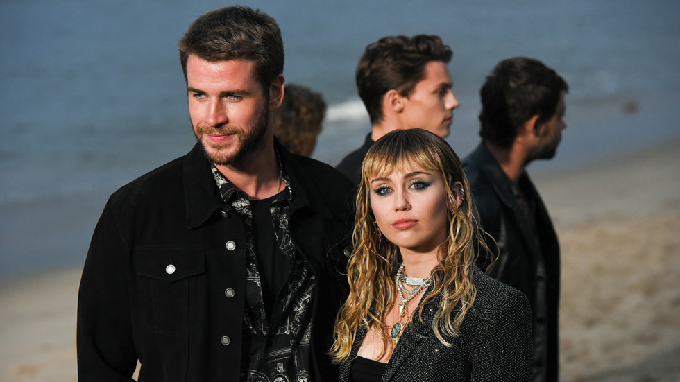 Miley Cyrus and husband Liam Hemsworth ©  Getty Images/Presley Ann / Stringer