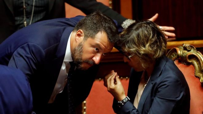 REUTERS / Matteo Salvini (L) speaking to party colleague Giulia Bongiorno