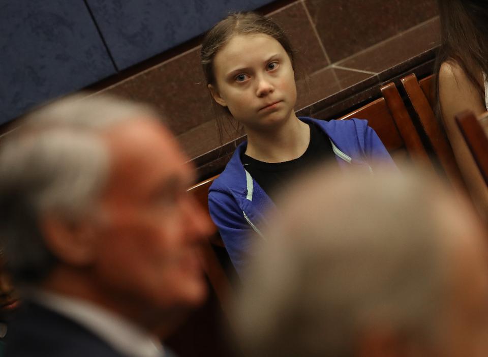 WASHINGTON, DC - SEPTEMBER 17: Greta Thunberg, the 16-year-old climate change activist from Sweden, casts a wary eye on Sen. Edward Markey during a Senate Climate Change Task Force meeting on Capitol Hill. (Photo by Mark Wilson/Getty Image