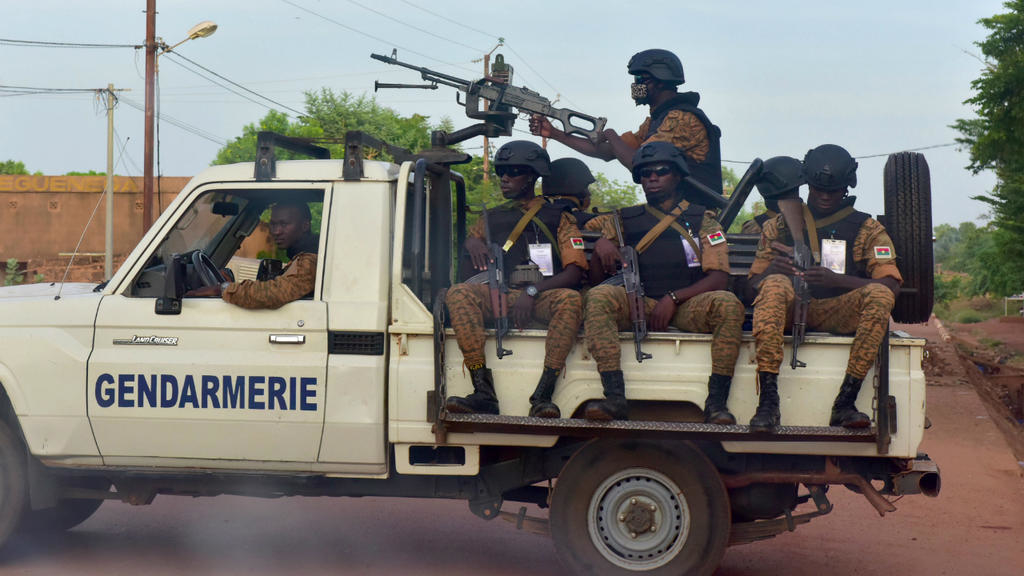 Issouf Sanogo, AFP | A picture take on October 30, 2018 shows Burkinabe gendarmes sitting on their vehicle in the city of Ouhigouya in the north of the country.