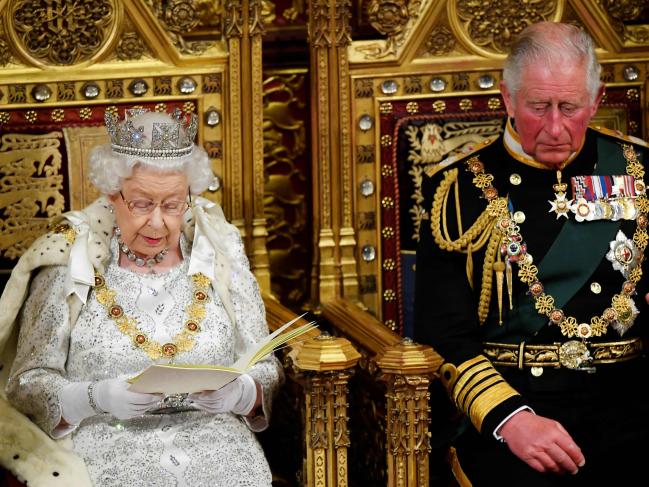 Britain's Queen Elizabeth II sits with Britain's Prince Charles as she delivers a speech at the State Opening of parliament. Picture: TOBY MELVILLE / POOL / AFP.Source:AFP