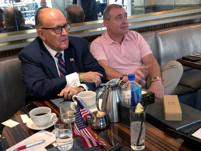 Rudy Giuliani (left) with Lev Parnas at the Trump International Hotel in Washington, DC, on September 20, 2019.