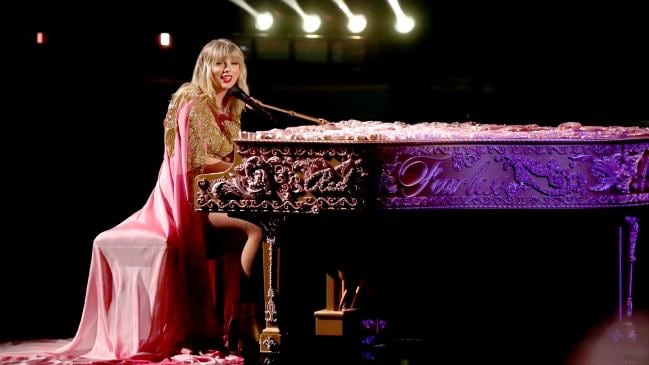Look closer at the piano. You can see ‘Red’, ‘Fearless’ and ‘1989’. Picture: JC Olivera/Getty ImagesSource:Getty Images