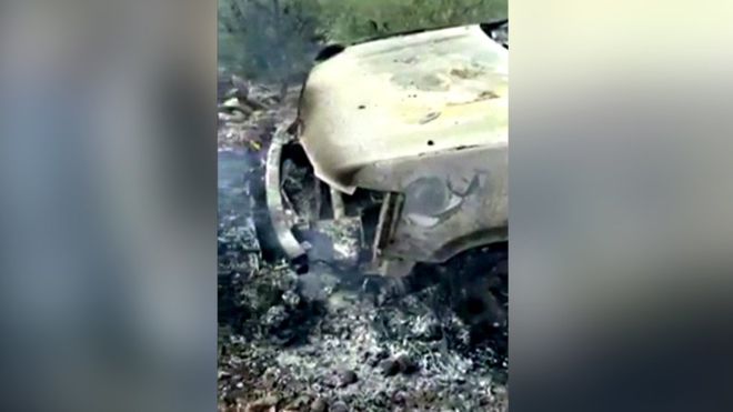 REUTERS / Mobile-phone footage showed a burnt-out car at the scene of the attack