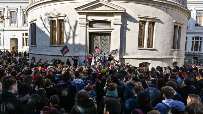 AFP / Protesters gathered at the Lyon university attended by the student