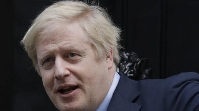 Britain's Prime Minister Boris Johnson returns to Downing Street after a meeting with the Queen. Picture: AP Photo/Matt Dunham.Source:AP