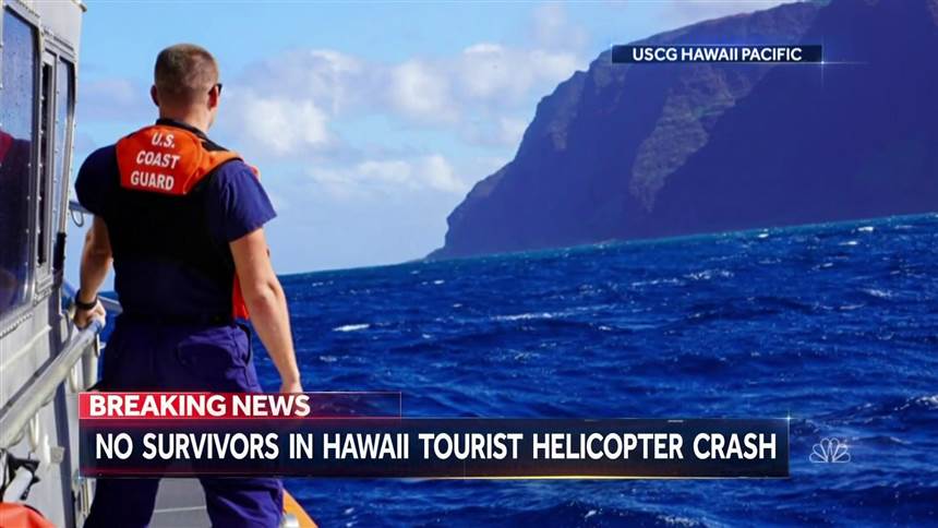 Coast Guard Cutter William Hart moves toward the Na Pali Coast on the Hawaiian island of Kauai on Friday, the day after a tour helicopter disappeared with seven people aboard. Authorities say wreckage of the helicopter has been found in a mountainous area