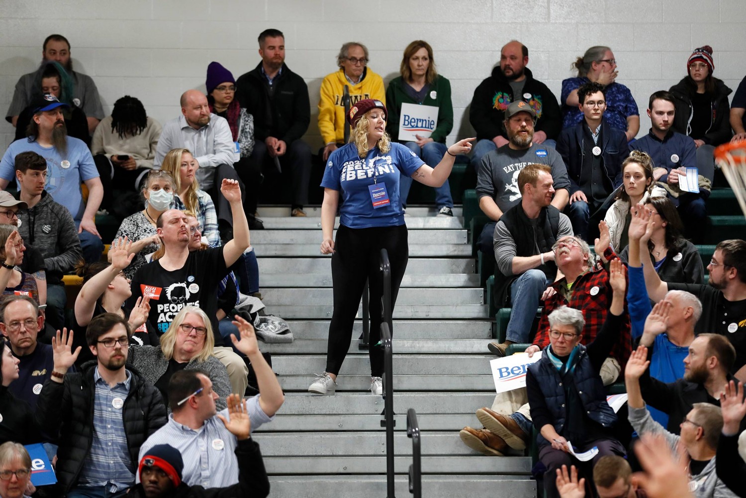 A precinct captain counts supporters during a Democratic party caucus in Des Moines, Iowa on Feb 3.   Photographer: Charlie Neibergall/AP Photo