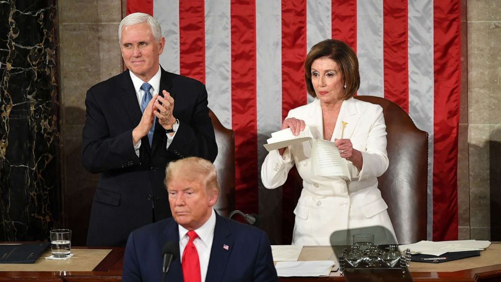 Mandel Ngan/AFP via Getty ImagesVice President Mike Pence claps as Speaker of the House Nancy Pelosi rips a copy of President Donald Trump speech after he delivers the State of the Union address at the US Capitol in Washington, Feb. 4, 2020.Vice Pr