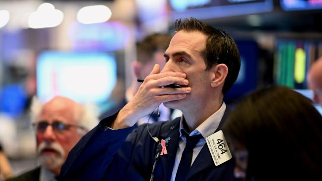 Traders work during the opening bell at the New York Stock Exchange. Picture: Johannes Eisele/AFPSource:AFP