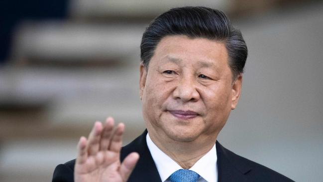 China's President Xi Jinping is sending aid around the world. But experts say he has a darker motive. (Photo by Pavel Golovkin / POOL / AFP)Source:AFP