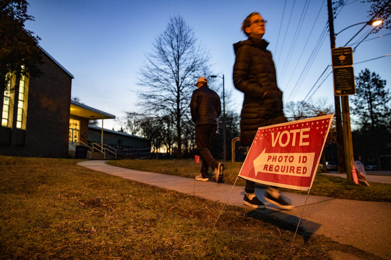 Voters outside of the Madison Community Center polling place for the Democratic presidential primary on Super Tuesday on March 3, 2020 in Arlington, Va. Samuel Corum, Getty Images