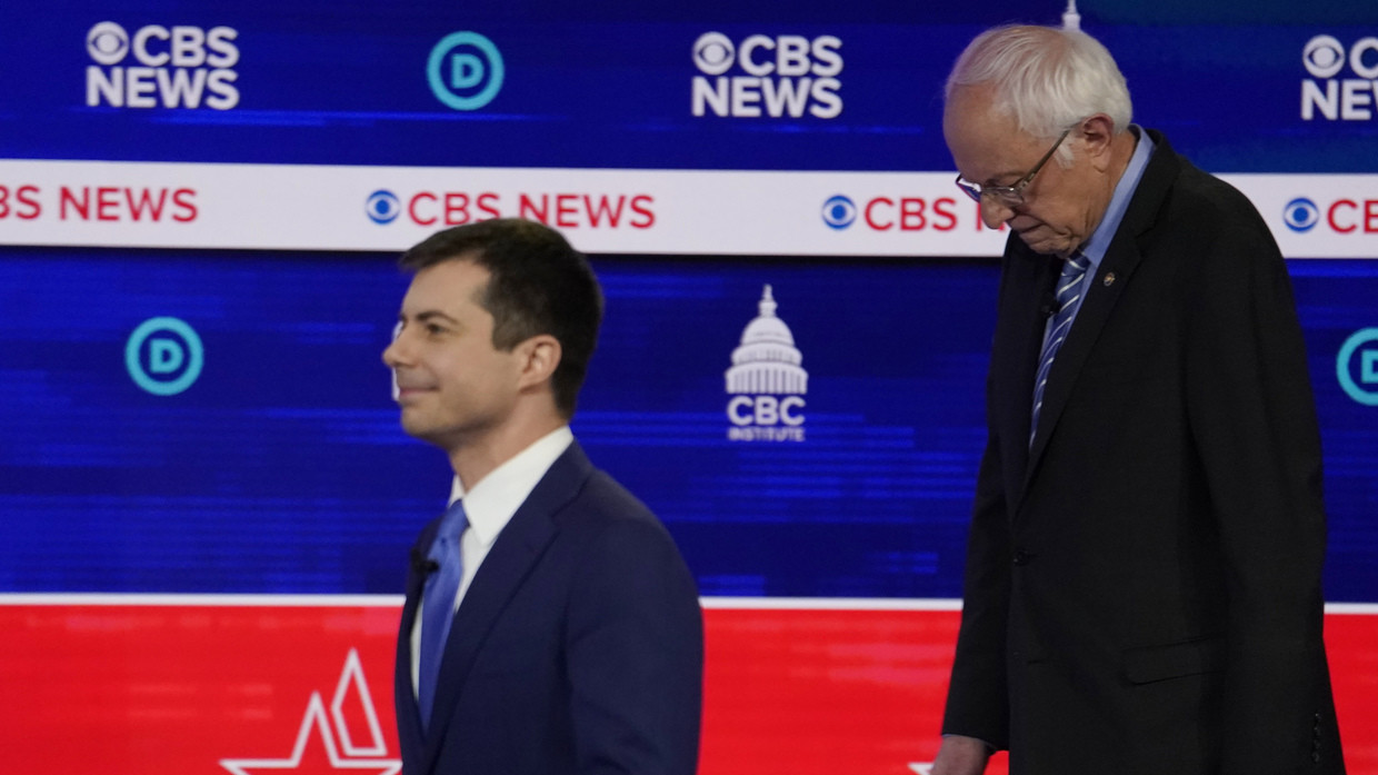 Democratic 2020 U.S. presidential candidate Senator Bernie Sanders follows South Bend Mayor Pete Buttigieg off stage at the conclusion of the tenth Democratic 2020 presidential debate at the Gaillard Center in Charleston, South Carolina, U.S., February 25