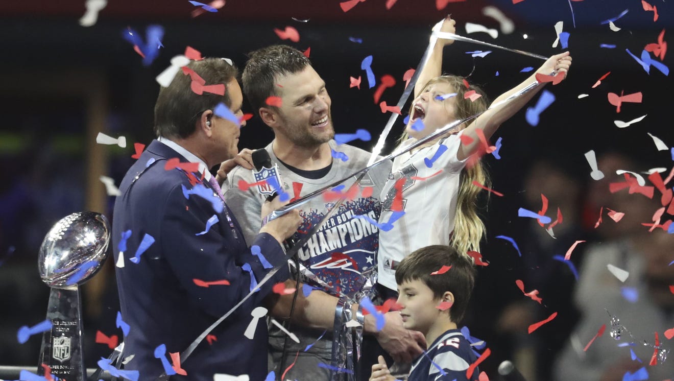 Tom Brady and his daughter, Vivian, celebrate after winning Super Bowl LIII at Mercedes-Benz Stadium. Kevin Jairaj, USA TODAY Sports