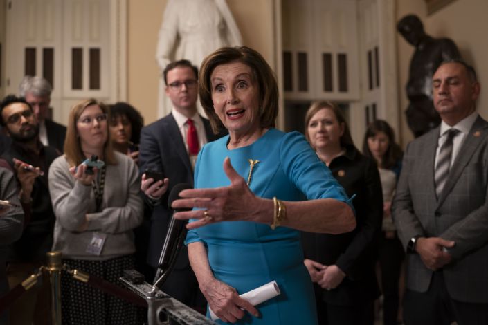 Speaker of the House Nancy Pelosi, D-Calif., makes a statement ahead of a planned late-night vote on the coronavirus aid package deal at the Capitol in Washington, Friday, March 13, 2020. (AP Photo/J. Scott Applewhite)