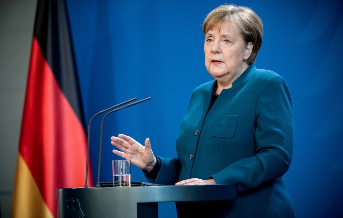 German Chancellor Angela Merkel gives a media statement on the spread of COVID-19 at the Chancellery in Berlin on March 22. She is now in self-isolation after her doctor tested positive for the disease. (Michel Kappeler/Pool/Reuters)