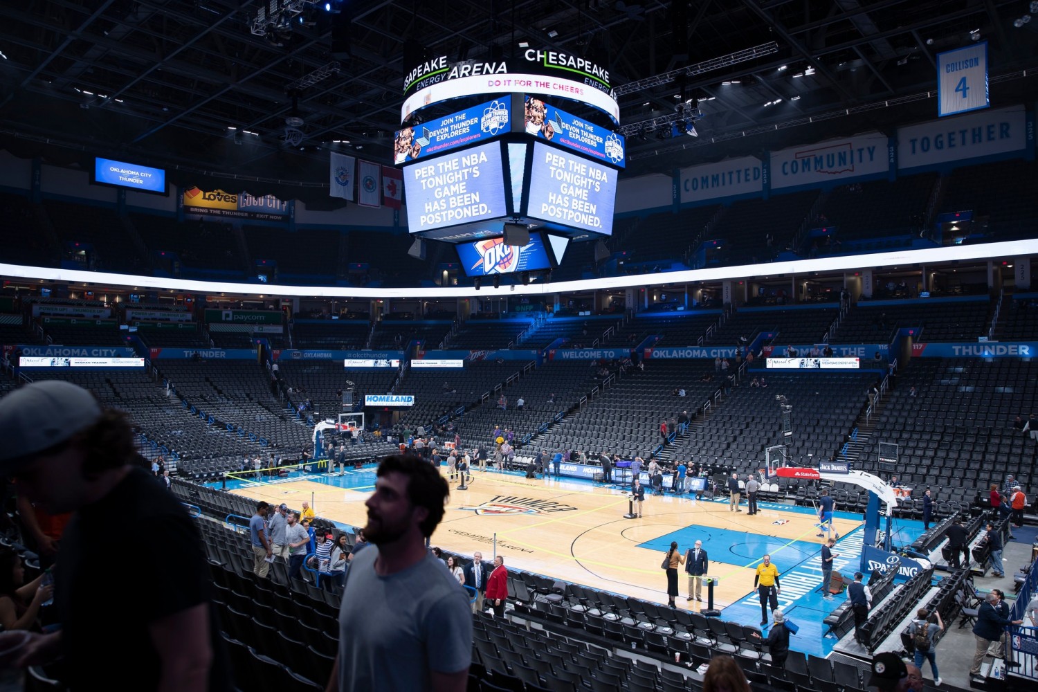 A message on the video board at Oklahoma City’s Chesapeake Energy Arena announced the postponement of the Thunder’s game against the Utah Jazz on Wednesday.Credit...Alonzo Adams/USA Today Sports, via Reuters