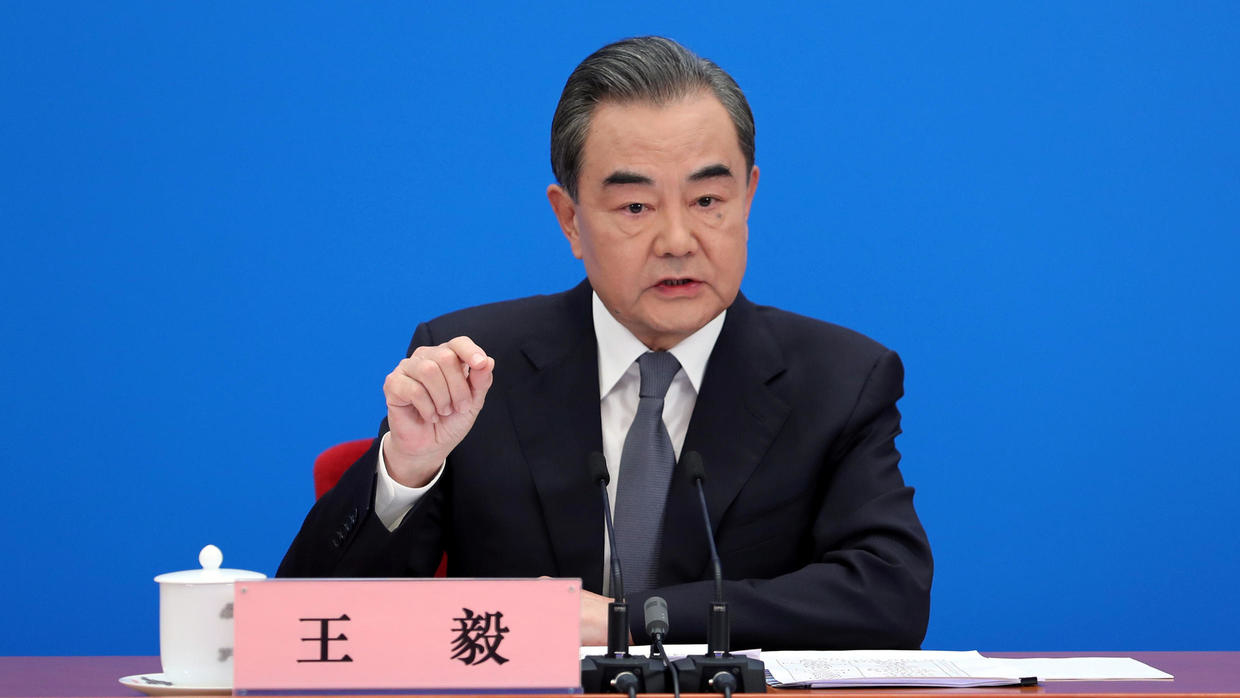 Chinese State Councillor and Foreign Minister Wang Yi speaks to reporters via video link at a news conference held on the sidelines of the National People's Congress (NPC) from the Great Hall of the People in Beijing on May 24, 2020. REUTERS 