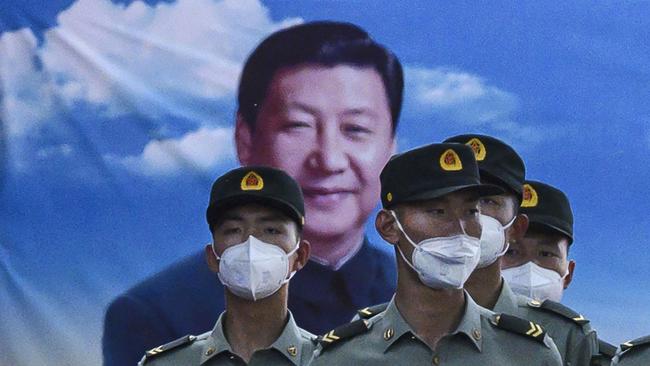 Soldiers of the People's Liberation Army's Honour Guard Battalion at their barracks outside the Forbidden City, near Tiananmen Square. Picture: Kevin Frayer/Getty ImagesSource:Getty Images