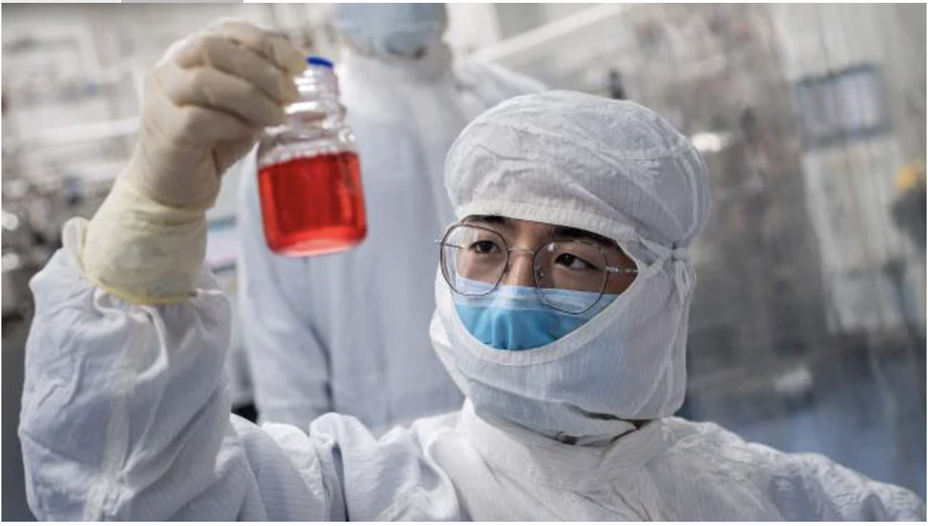 An engineer working on an experimental vaccine for the COVID-19 at the Sinovac Biotech facilities in Beijing. Picture: NICOLAS ASFOURI / AFPSource:AFP