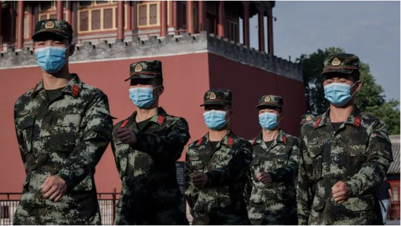 China will step up its preparedness for armed combat and improve its ability to carry out military tasks, according to state media reports. (Photo by NICOLAS ASFOURI / AFP)Source:AFP