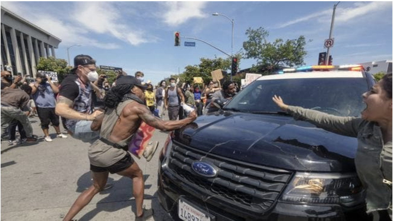  Protests across the country have escalated over the death of George Floyd who died after being restrained by Minneapolis police officers. Picture: AP Photo/Ringo H.W. ChiuSource:AP