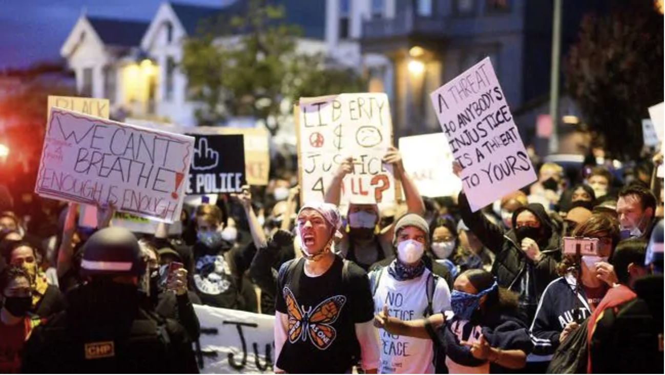  Demonstrators face off against police officers in Oakland, California. Picture: AP P/Noah BergerSource:AP