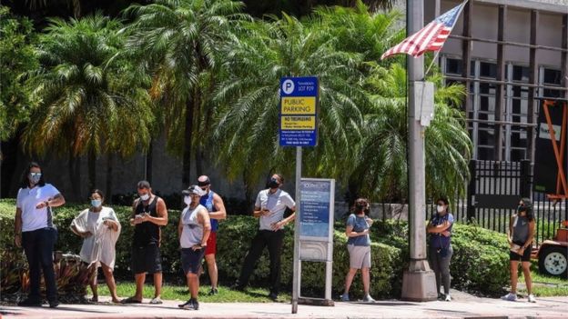 People wait to be tested in Miami Beach. Florida has confirmed nearly 110,000 cases