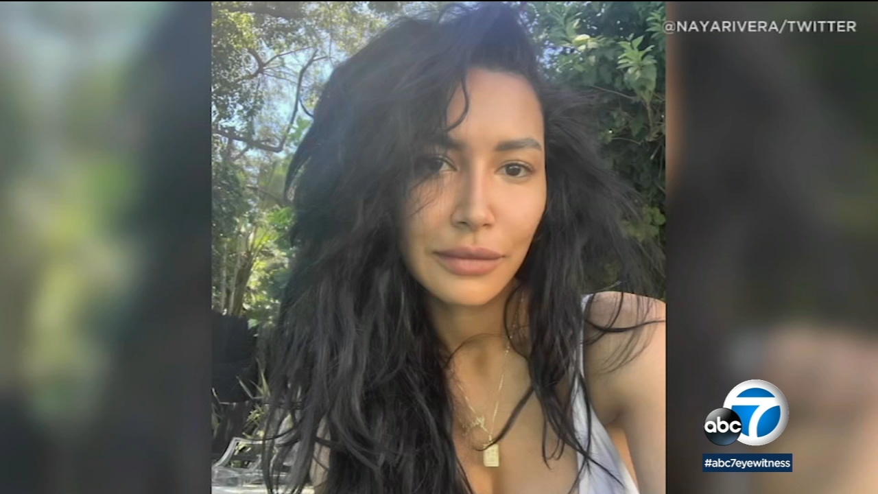 An autopsy report released Friday says "Glee" actor Naya Rivera raised her arm and called for help as she accidentally drowned while boating with her 4-year-old son on a California lake.