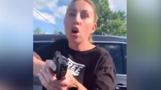 TWITTER / Jillian Wuestenberg was filmed pointing the gun at the family