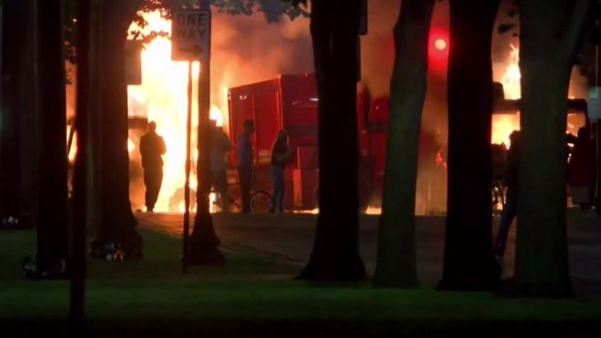 Protesters set vehicles on fire in Kenosha