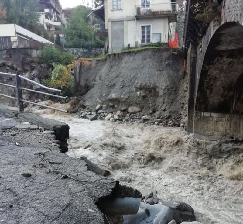 EPA / Damaged caused to a road near Cuneo in Italy's Piedmont region