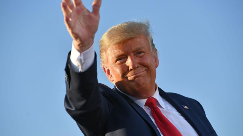 US President Donald Trump waves as he leaves a rally in Tucson, Arizona on October 19, 2020. Picture: Mandel Ngan/AFPSource:AFP