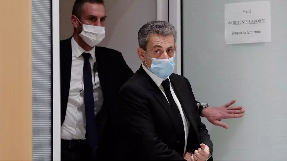 Former French President Nicolas Sarkozy leaves the courtroom during his trial on charges of corruption and influence peddling, at Paris courthouse, France, December 7, 2020. © REUTERS/Benoit Tessier