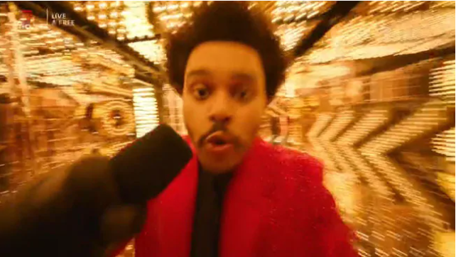 The Weeknd suddenly entered a bright gold room for one section of the show, with his face eerily distorted in the camera. Picture: Channel 7Source:Channel 7
