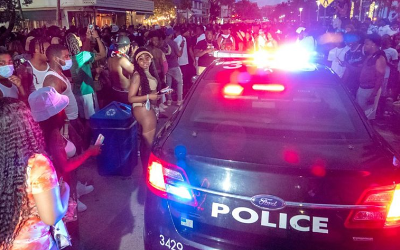 People in Miami react to news of the curfew