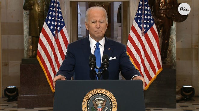 U.S. President Joe Biden slams Trump while making remarks in Statuary Hall on Capitol Hill one year after the Jan. 6 insurrection. / ASSOCIATED PRESS