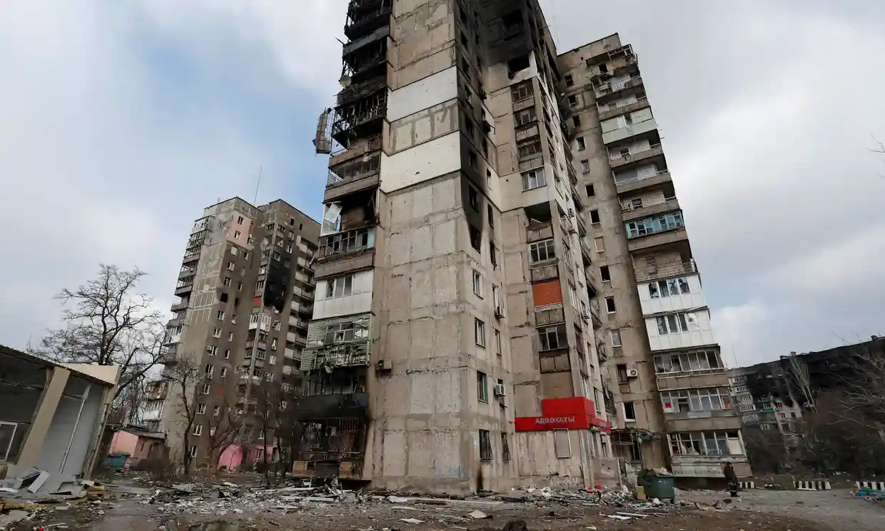 Residential buildings damaged by Russia shelling in the besieged southern port city of Mariupol, Ukraine, on Friday. Photograph: Alexander Ermochenko/Reuters