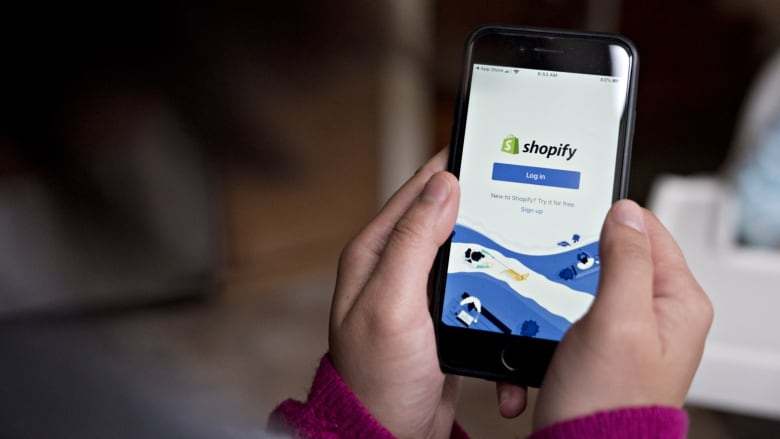 Shopify is laying off about 10 per cent of its workforce. At one point in mid-2020, Shopify became the most valuable company in Canada with a valuation of almost half a trillion dollars. (Andrew Harrer/Bloomberg)
