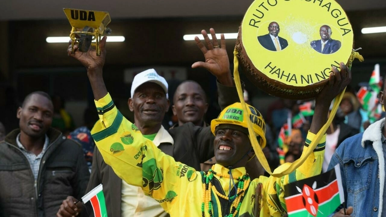 Supporters of Kenya President elect William Ruto react as they gather at the Moi International Sports Center Kasarani in Nairobi, Kenya, on September 13, 2022. © Simon Maina , AFP