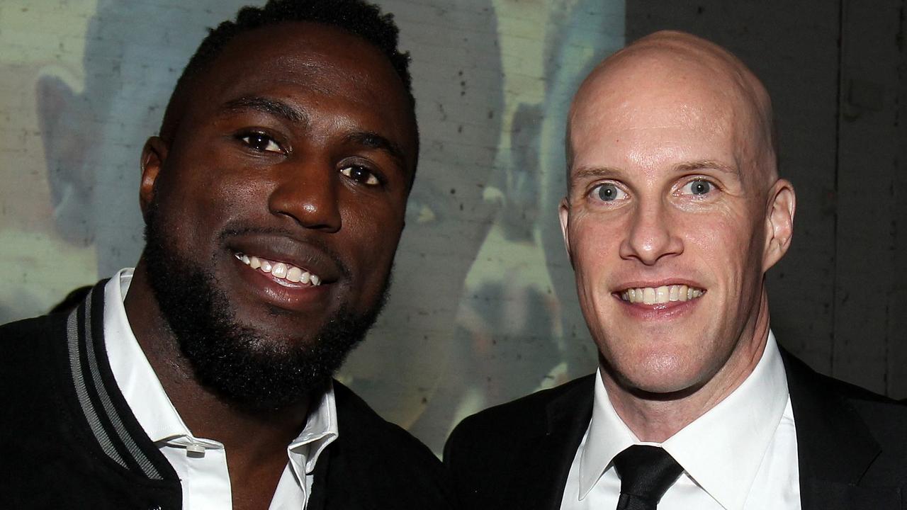 US sportswriter Grant Wahl and US soccer player Jozy Altidore. Photo by Mike Lawrie / GETTY IMAGES NORTH AMERICA / AFP.