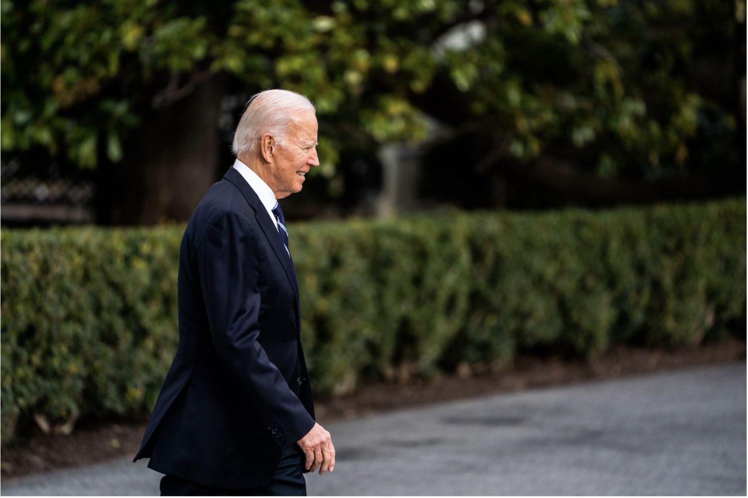 President Biden makes his way to Marine One on the South Lawn of the White House on Friday. (Demetrius Freeman/The Washington Post)
